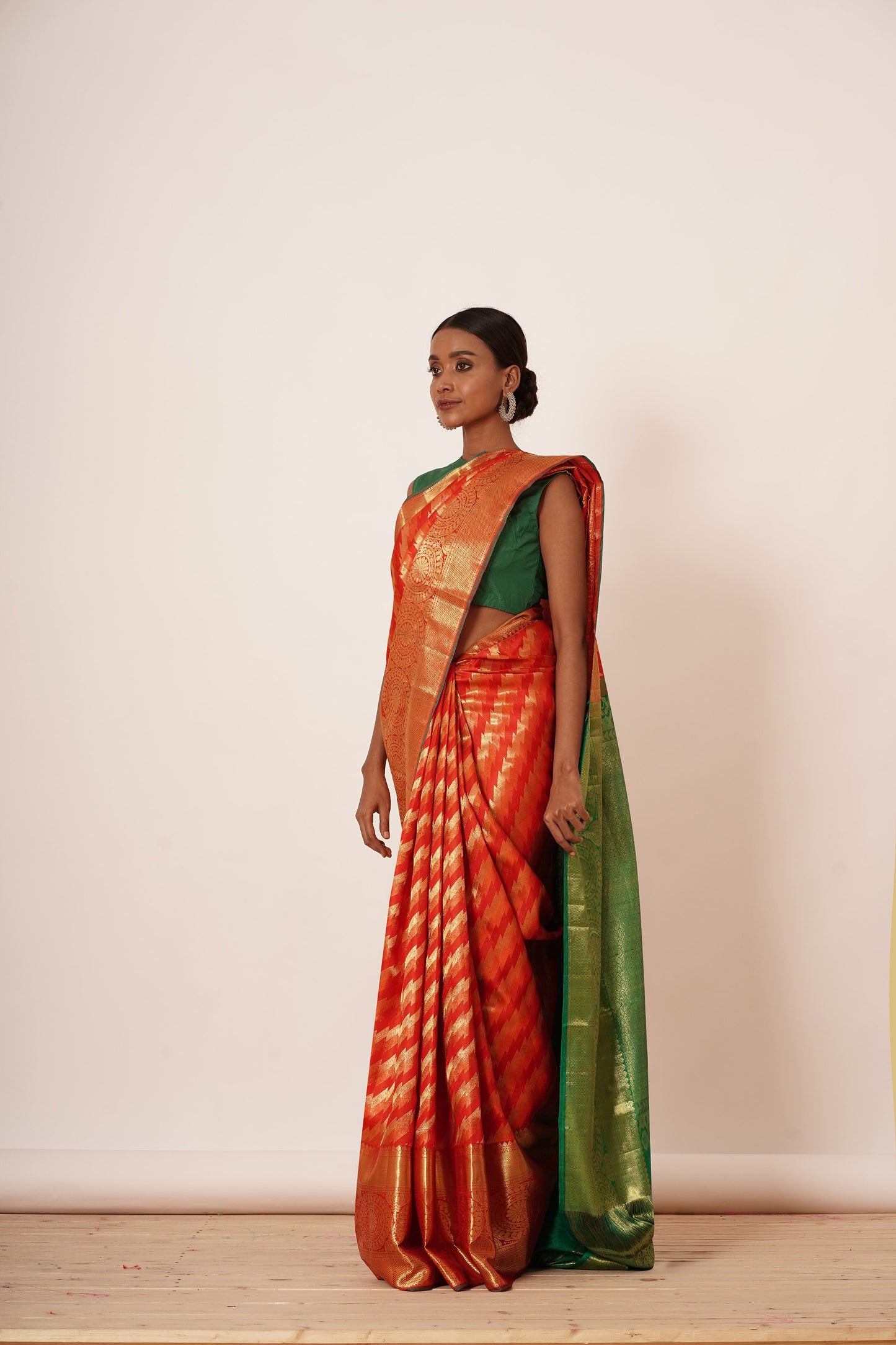 Red and Gold Dharmavaram Silk Saree with Dark Green Blouse