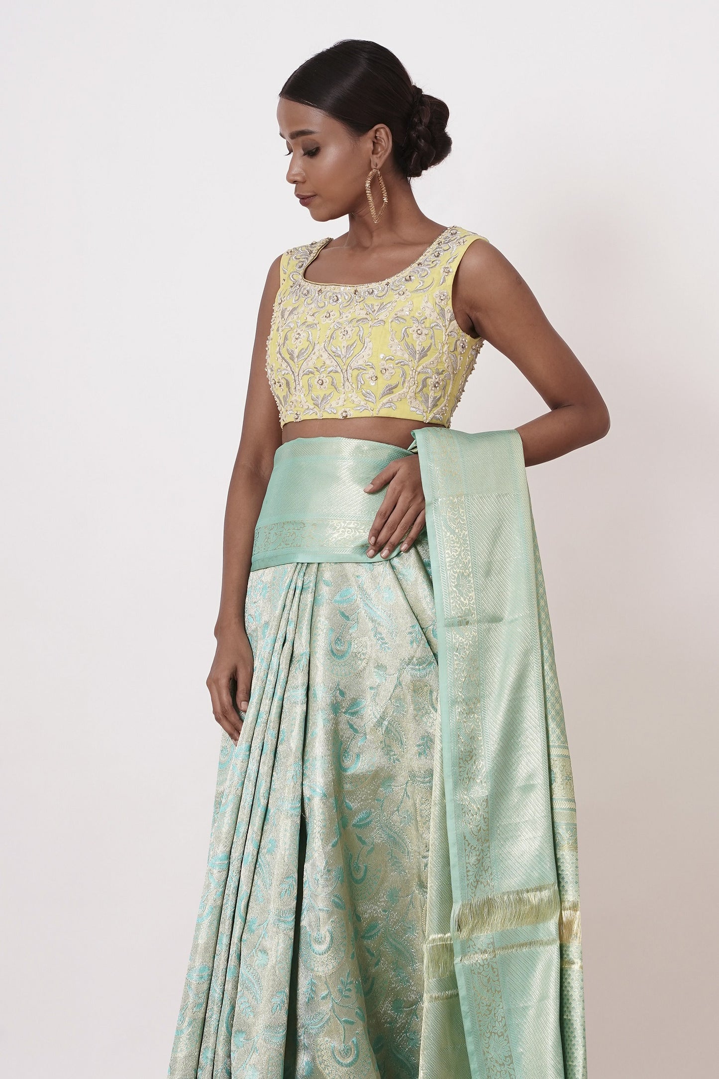 Turqouise Dharamavaram Silk Saree with a Lemon Yelllow Blouse