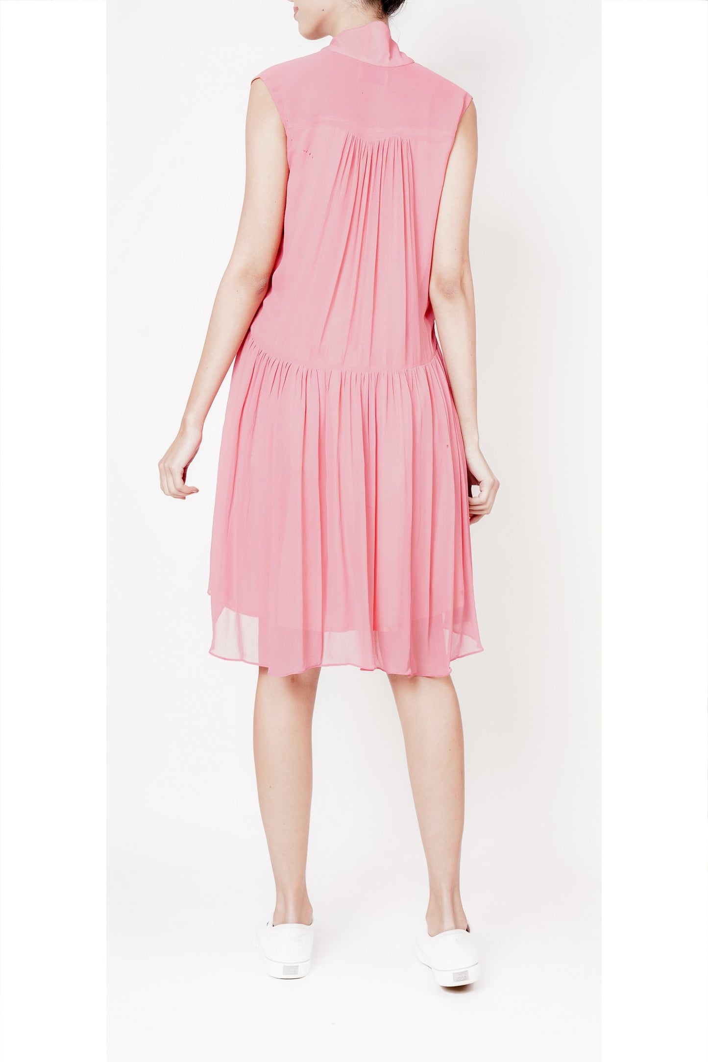 Flared coral pleated dress