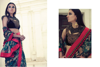 Navy blue printed sari with heavy embroidered velvet blouse