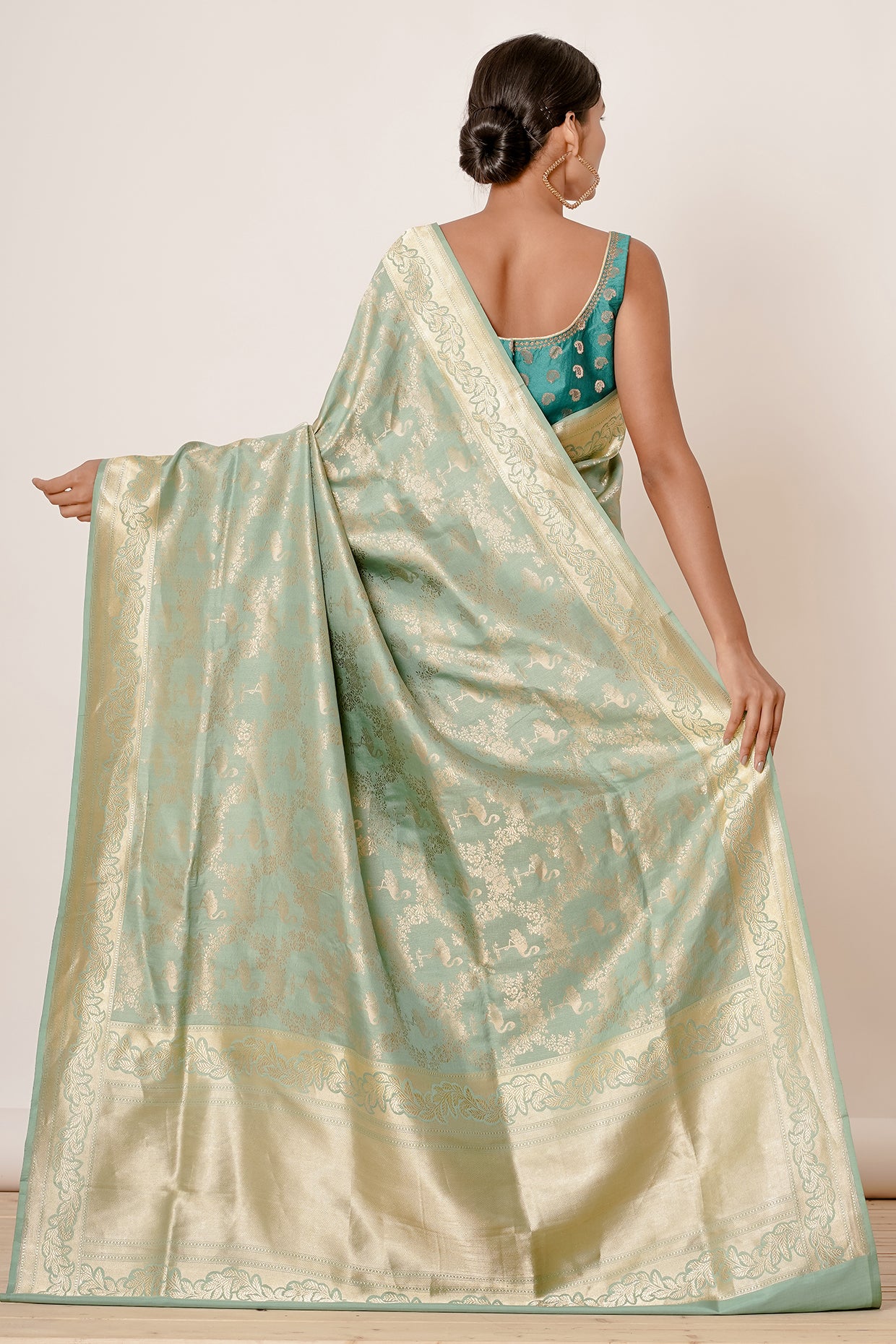 Pastel Blue Banarasi Silk Saree with Backless Blouse