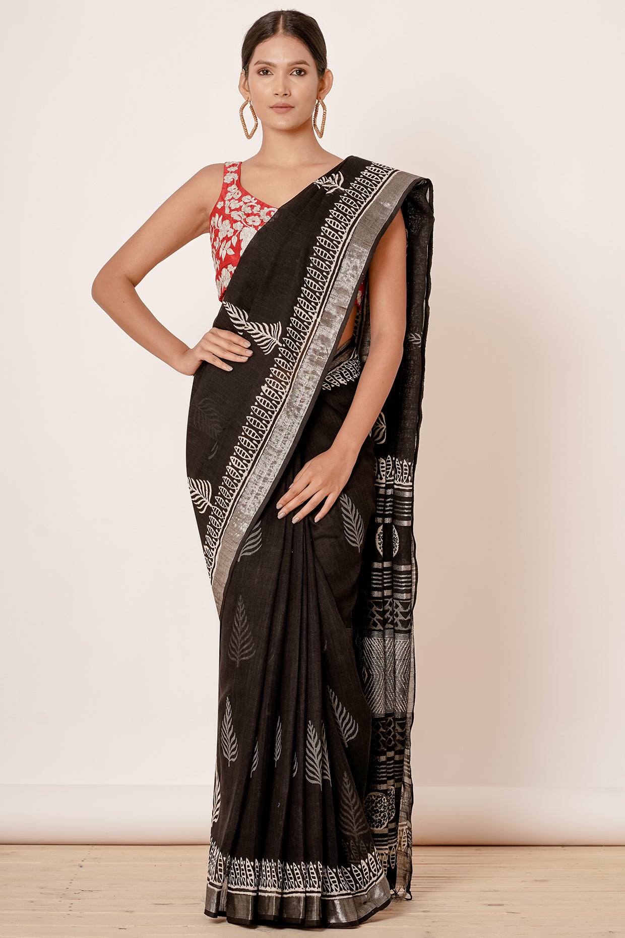 Black Hand Block Printed Linen Saree with Brick Red Blouse all over Zari Embroidery
