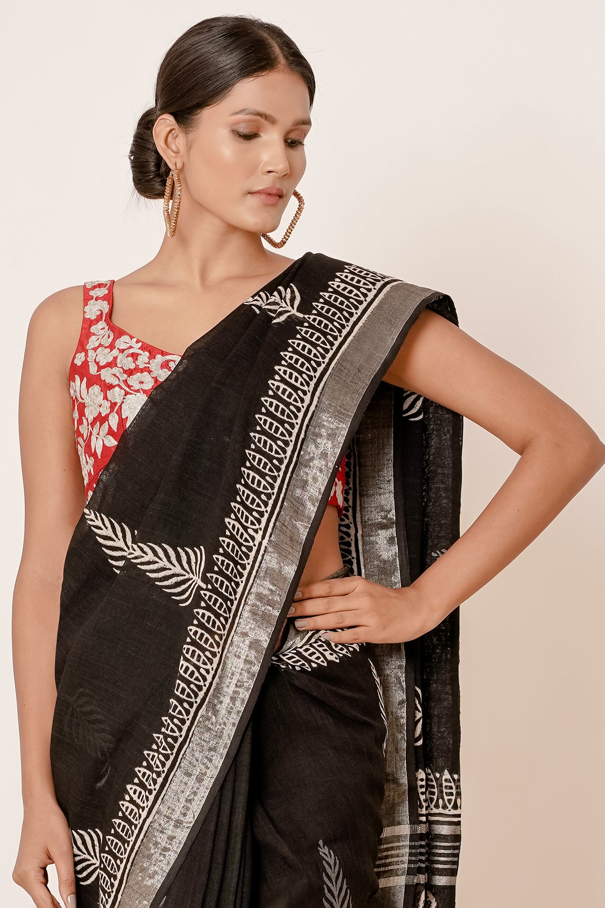 Black Hand Block Printed Linen Saree with Brick Red Blouse all over Zari Embroidery
