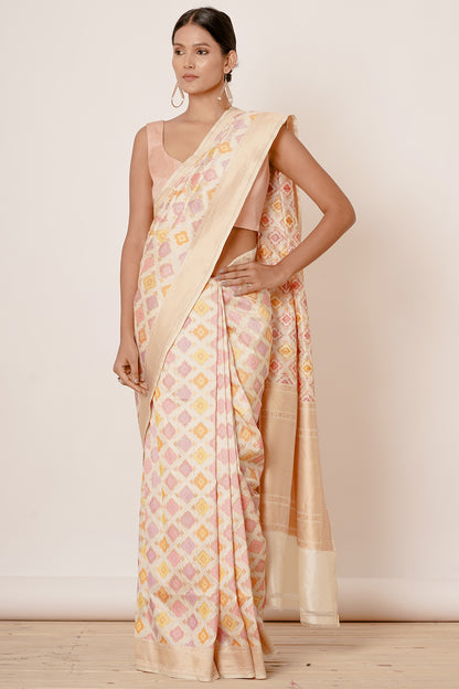 Ivory Banarasi Saree with Peach Blouse