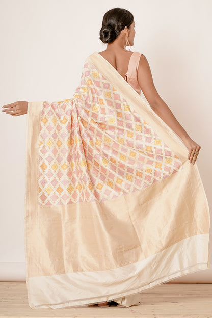 Ivory Banarasi Saree with Peach Blouse