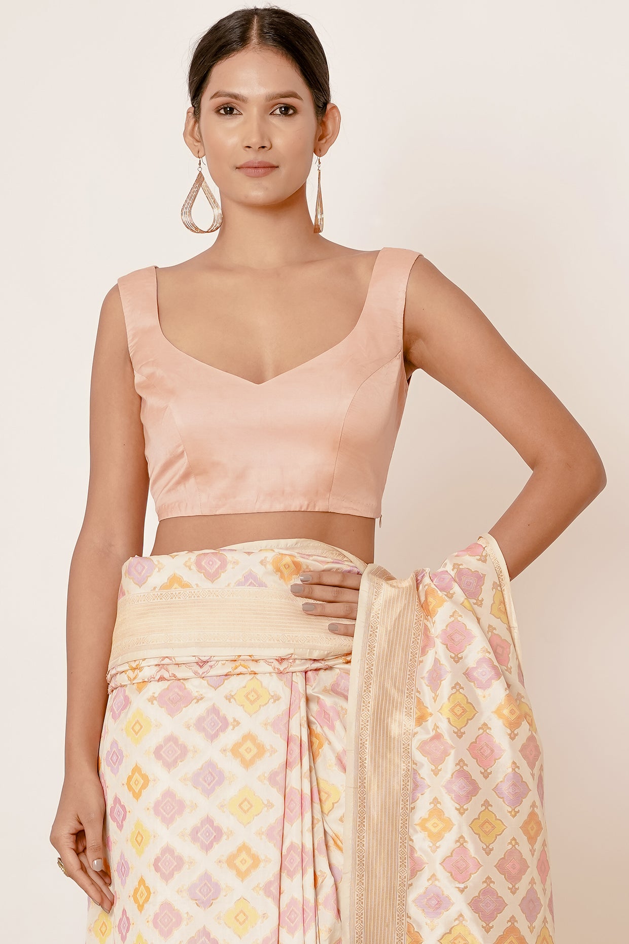 Ivory Banarasi Saree with Peach Blouse