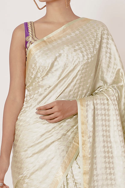 Ivory Banarasi Silk Saree with Violet Gold Zari Embroidered Blouse