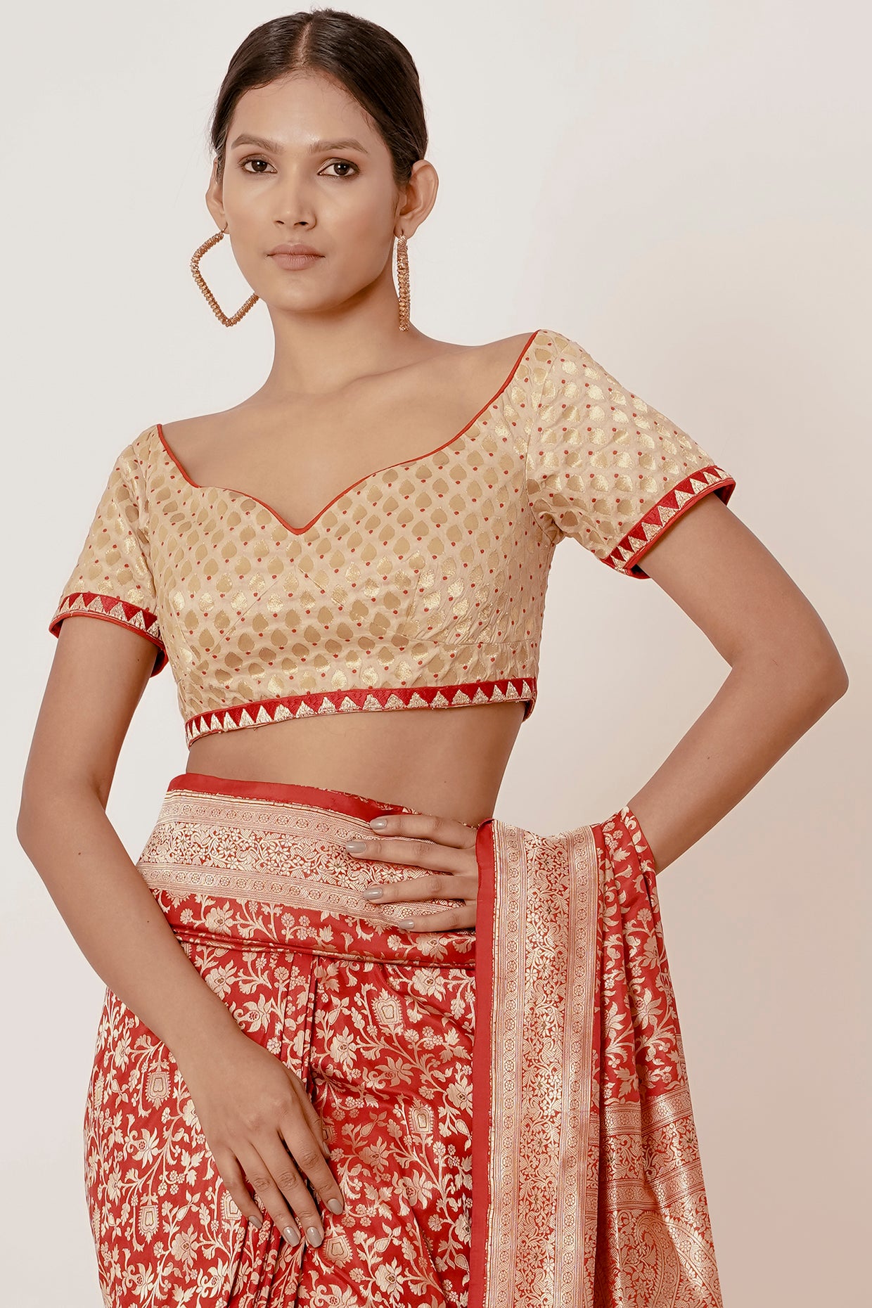 Red Ganarasi Silk Saree with Gold Backless Blouse