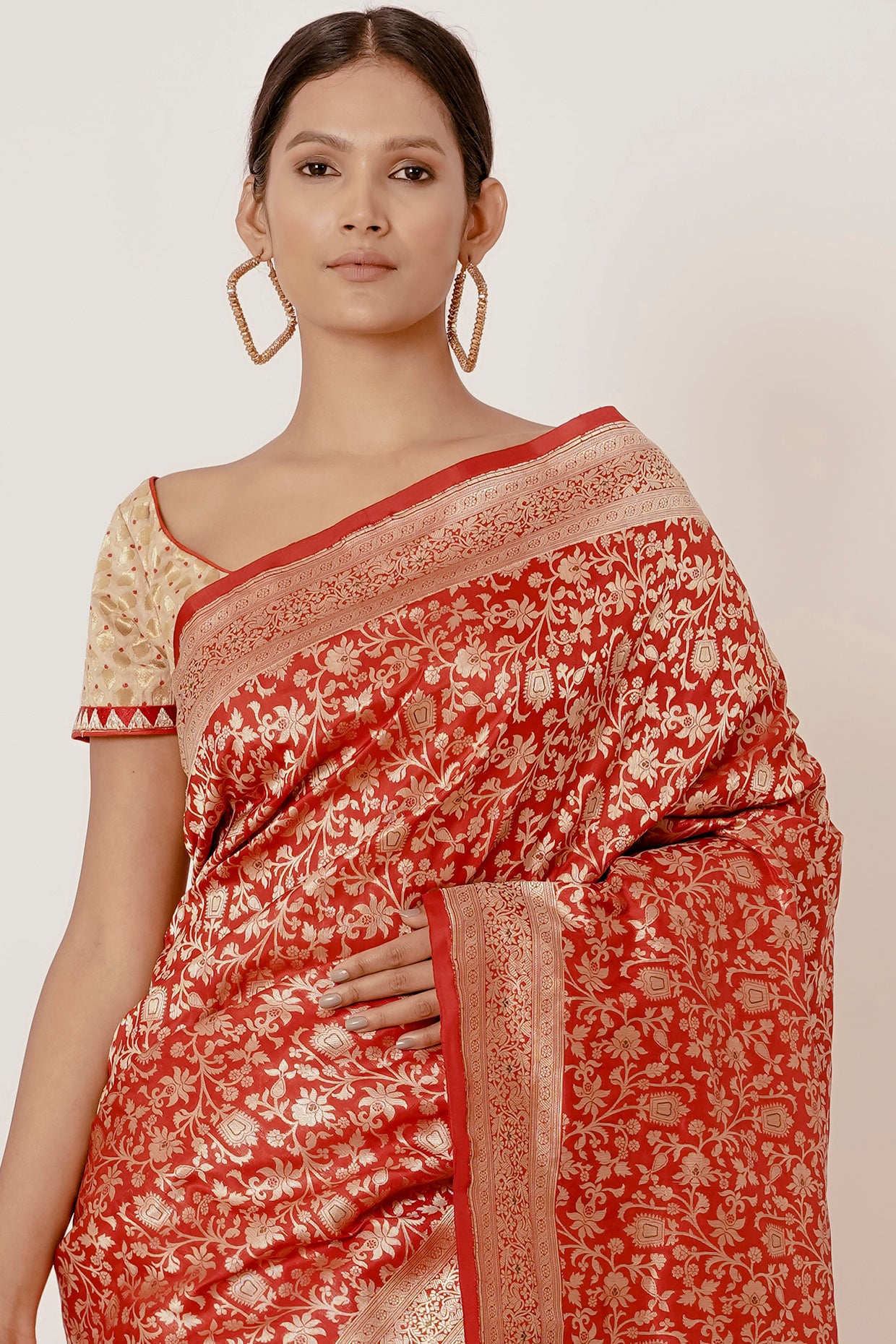 Red Ganarasi Silk Saree with Gold Backless Blouse
