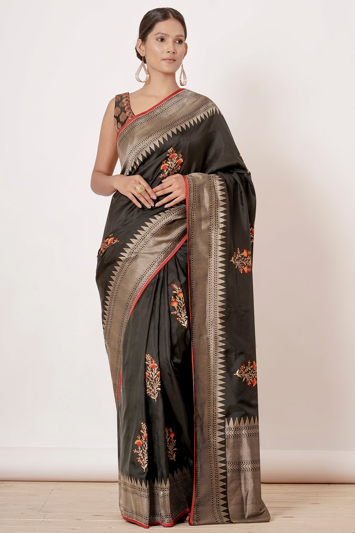 Black Banarasi Silk Saree with Floral Motifs all over and Black Brocade Blouse