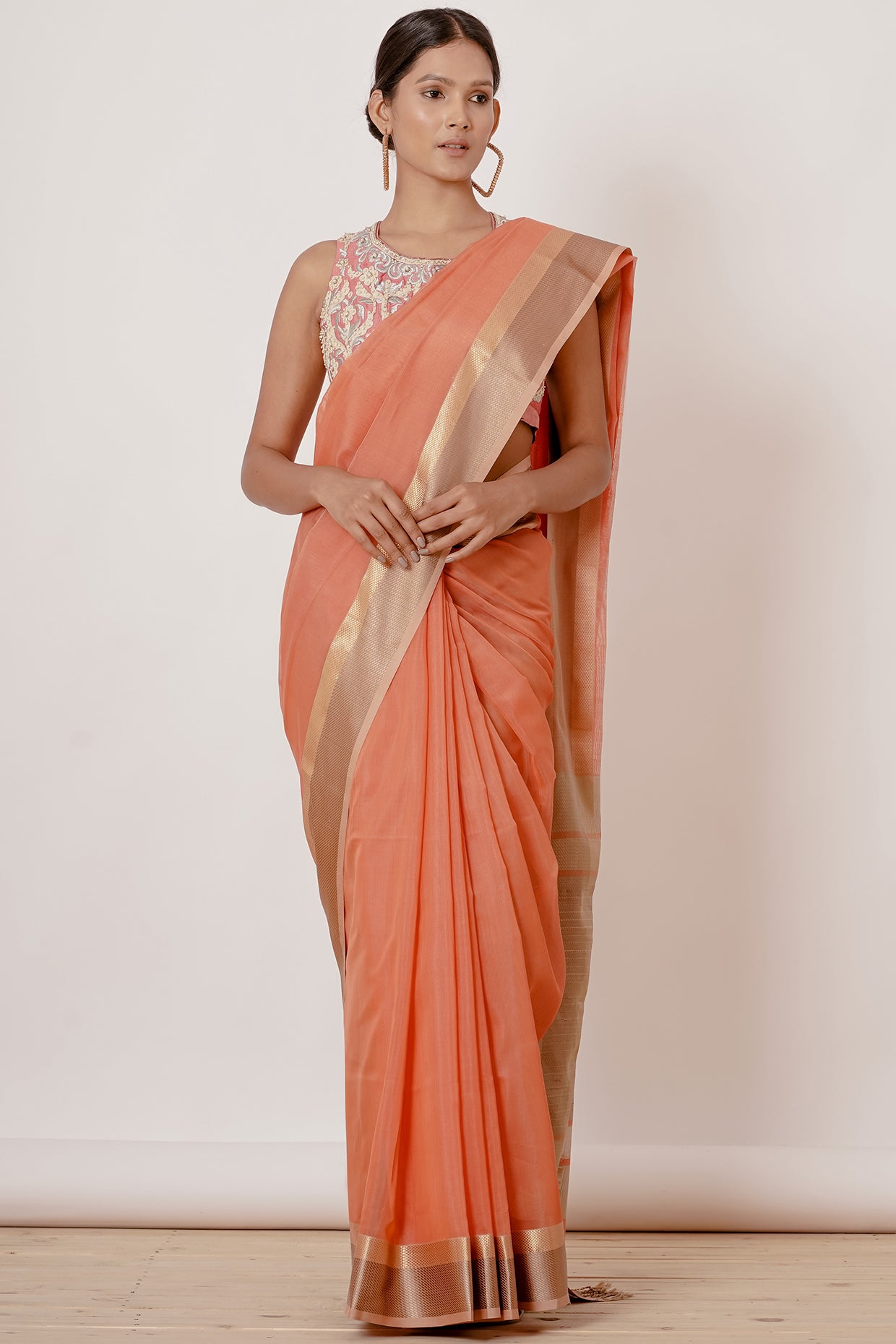 Coral Coloured Maheshwari Silk Saree with a Peach Blouse