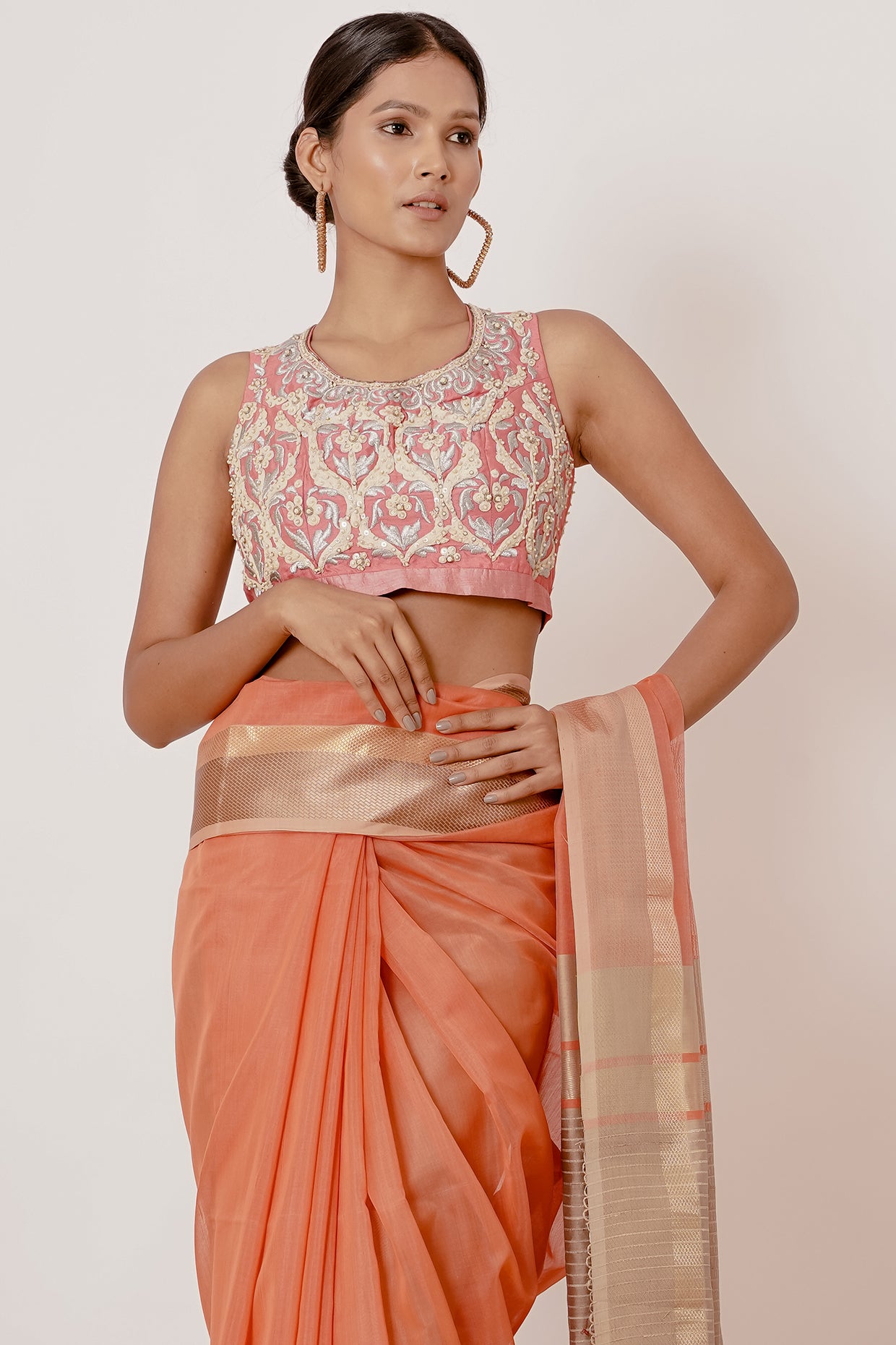Coral Coloured Maheshwari Silk Saree with a Peach Blouse