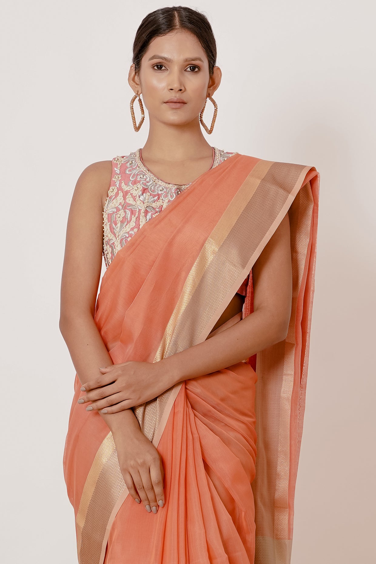 Coral Coloured Maheshwari Silk Saree with a Peach Blouse