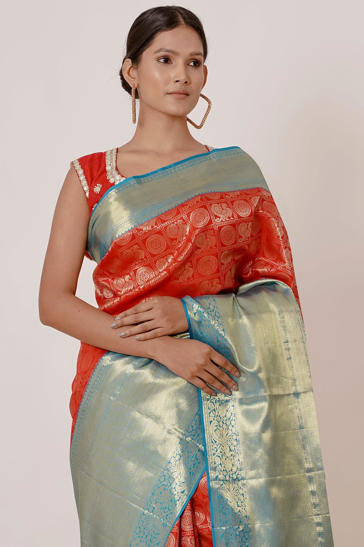 Red Dharmavaram Silk Saree with a Brick Red Blouse