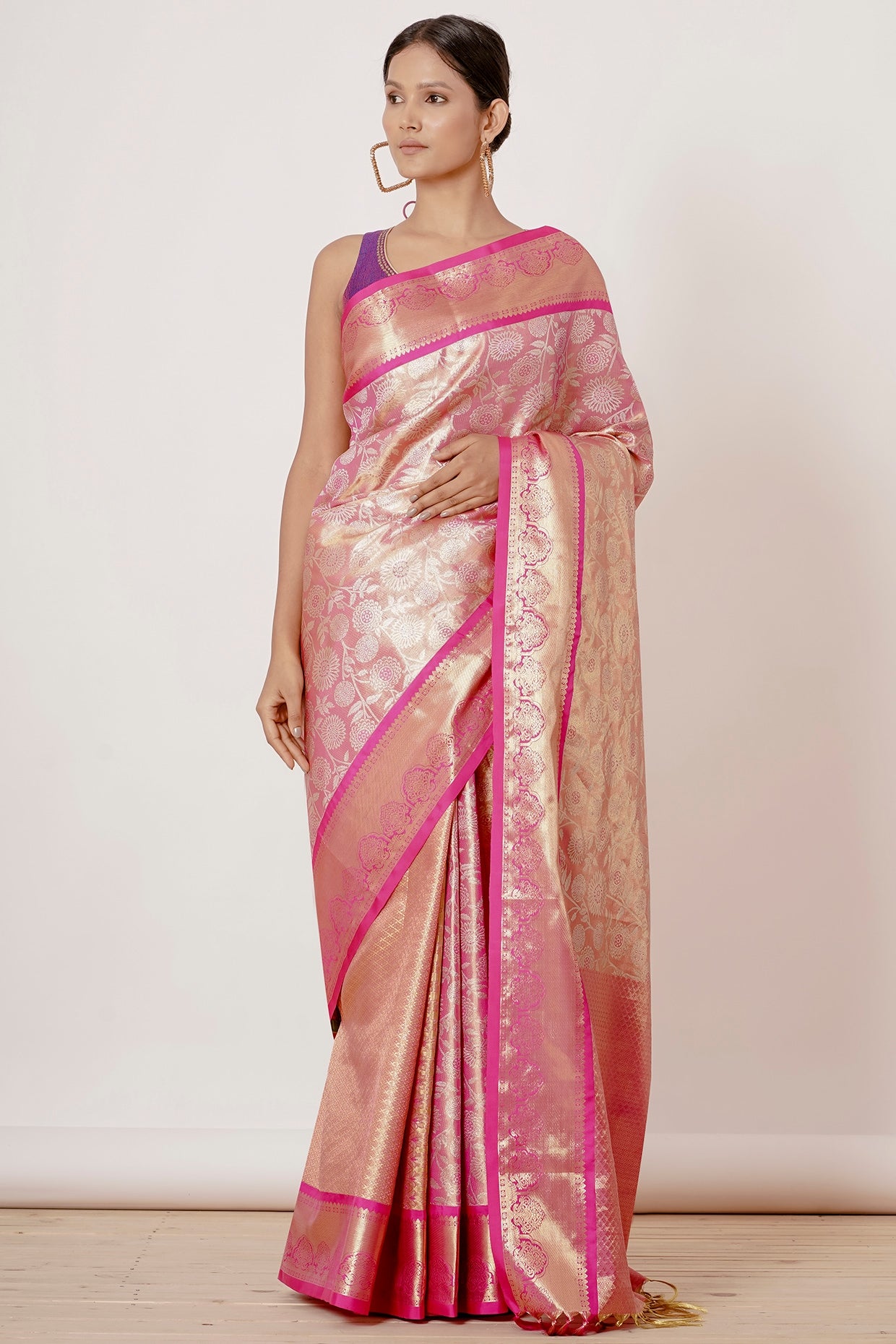 Onion Pink Dharmavaram Silk Saree with a Purple Backless Blouse
