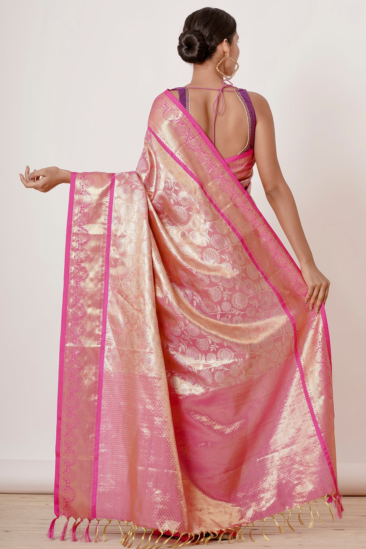 Onion Pink Dharmavaram Silk Saree with a Purple Backless Blouse