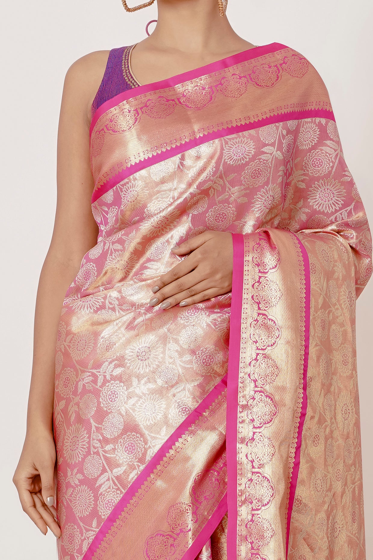 Onion Pink Dharmavaram Silk Saree with a Purple Backless Blouse