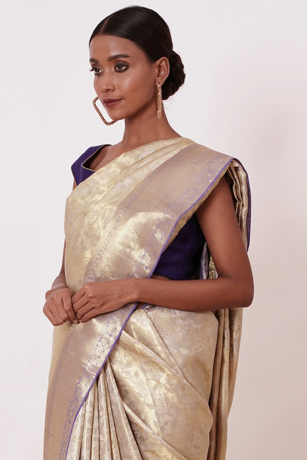 Ivory Gold Dharamavaram Silk Saree with a Dark Blue Blouse