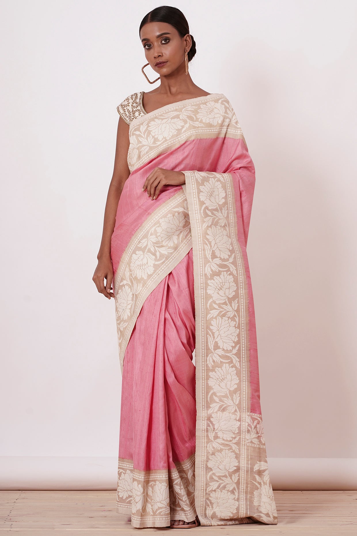 Onion Pink Banarasi Saree with a Cream Blouse