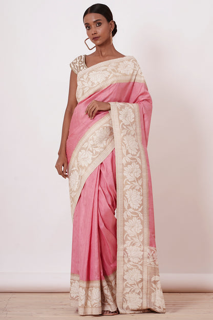 Onion Pink Banarasi Saree with a Cream Blouse