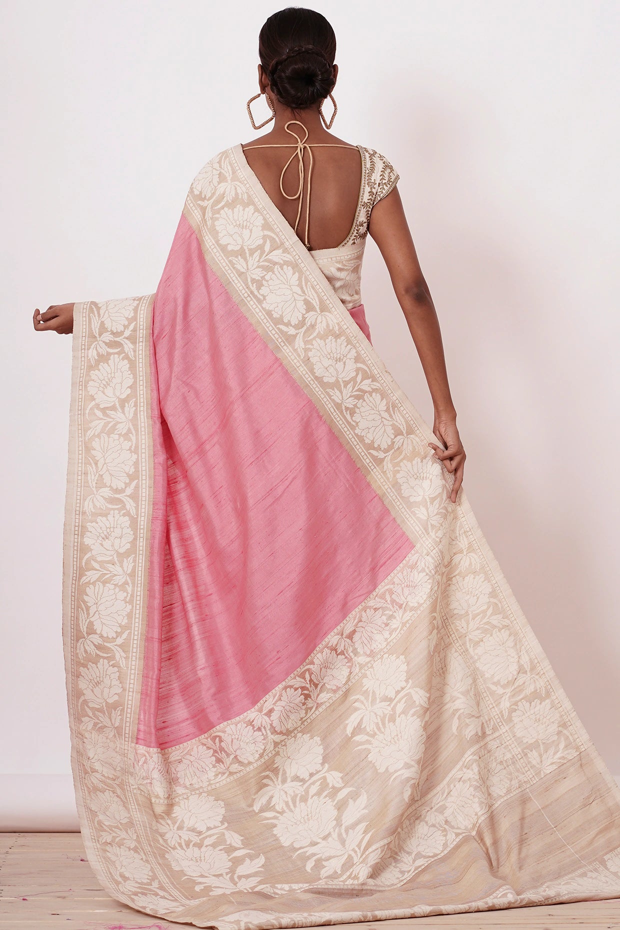 Onion Pink Banarasi Saree with a Cream Blouse