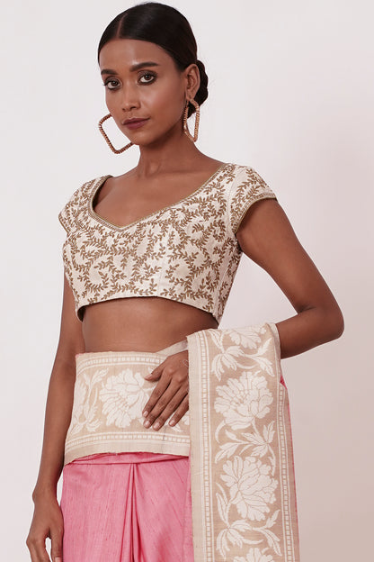 Onion Pink Banarasi Saree with a Cream Blouse