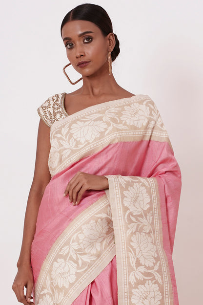 Onion Pink Banarasi Saree with a Cream Blouse