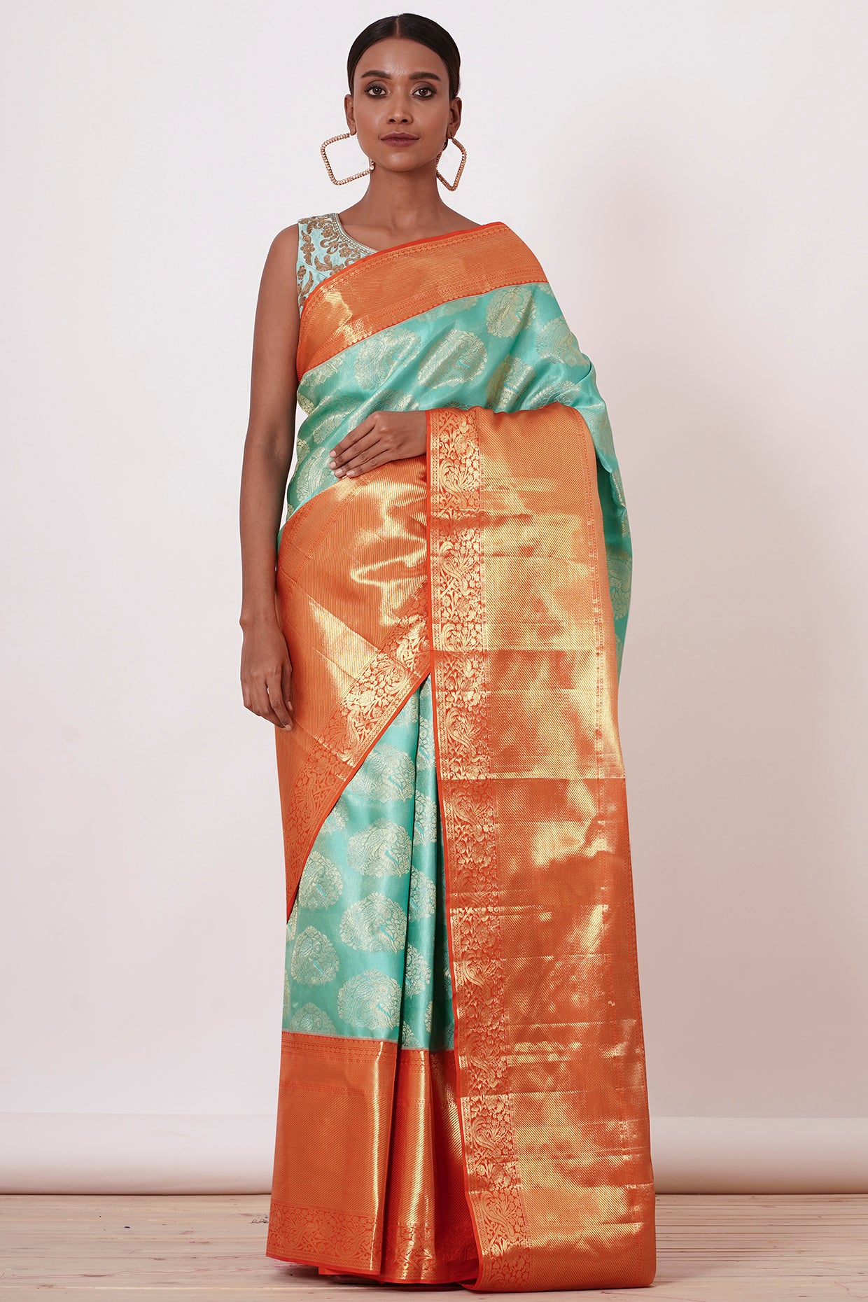 Turqouise Dharamavaram Silk Saree with a Light Turqouise Blouse