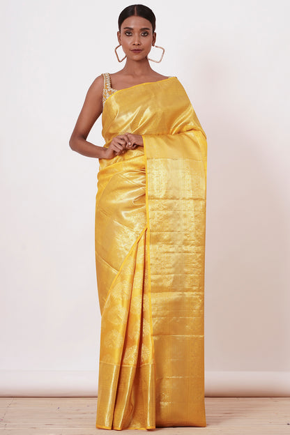Royal Yellow Dharamavaram Silk Saree with a Gold Blouse .