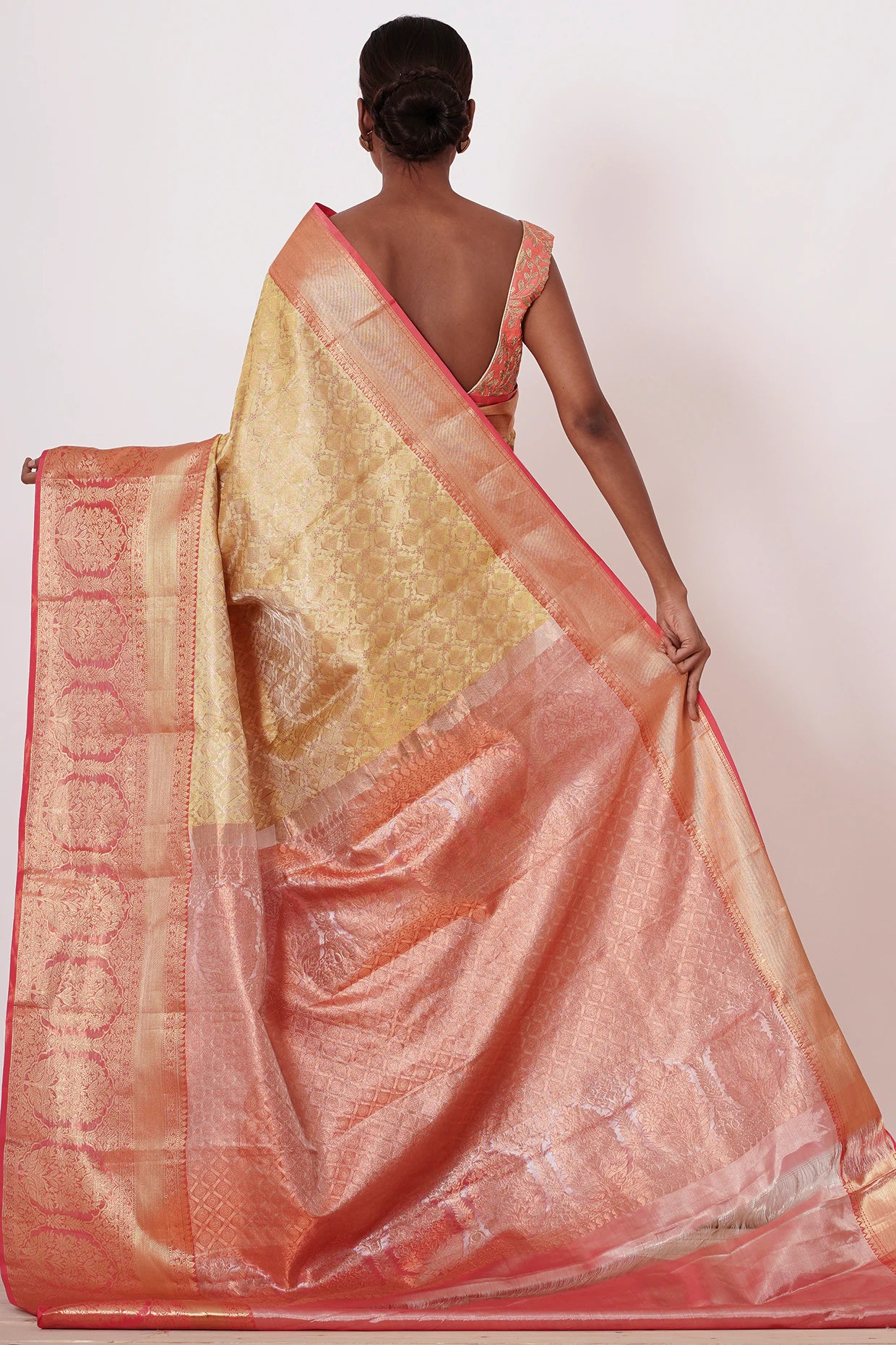 Gold Dharamavaram Silk Saree with a Peach Blouse