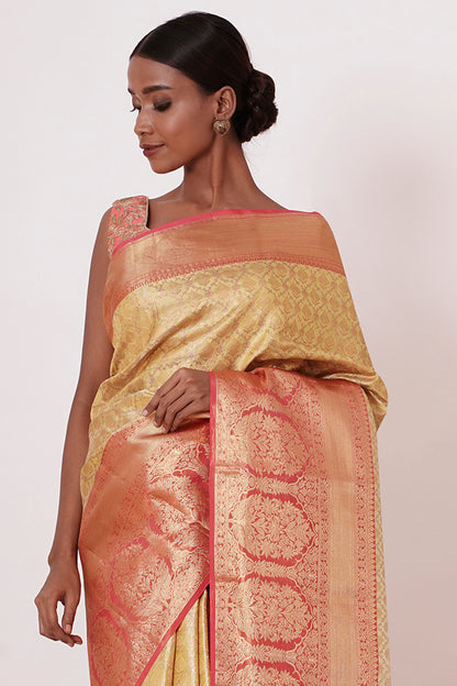 Gold Dharamavaram Silk Saree with a Peach Blouse