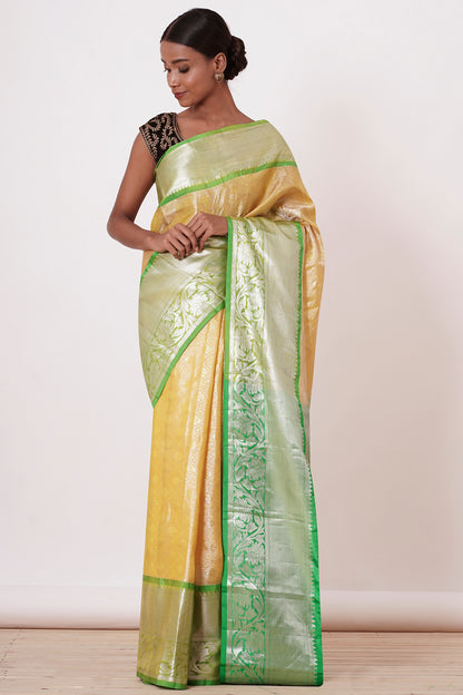 Pastel Yellow Saree with Green Border with Embroidered Velvet Blouse