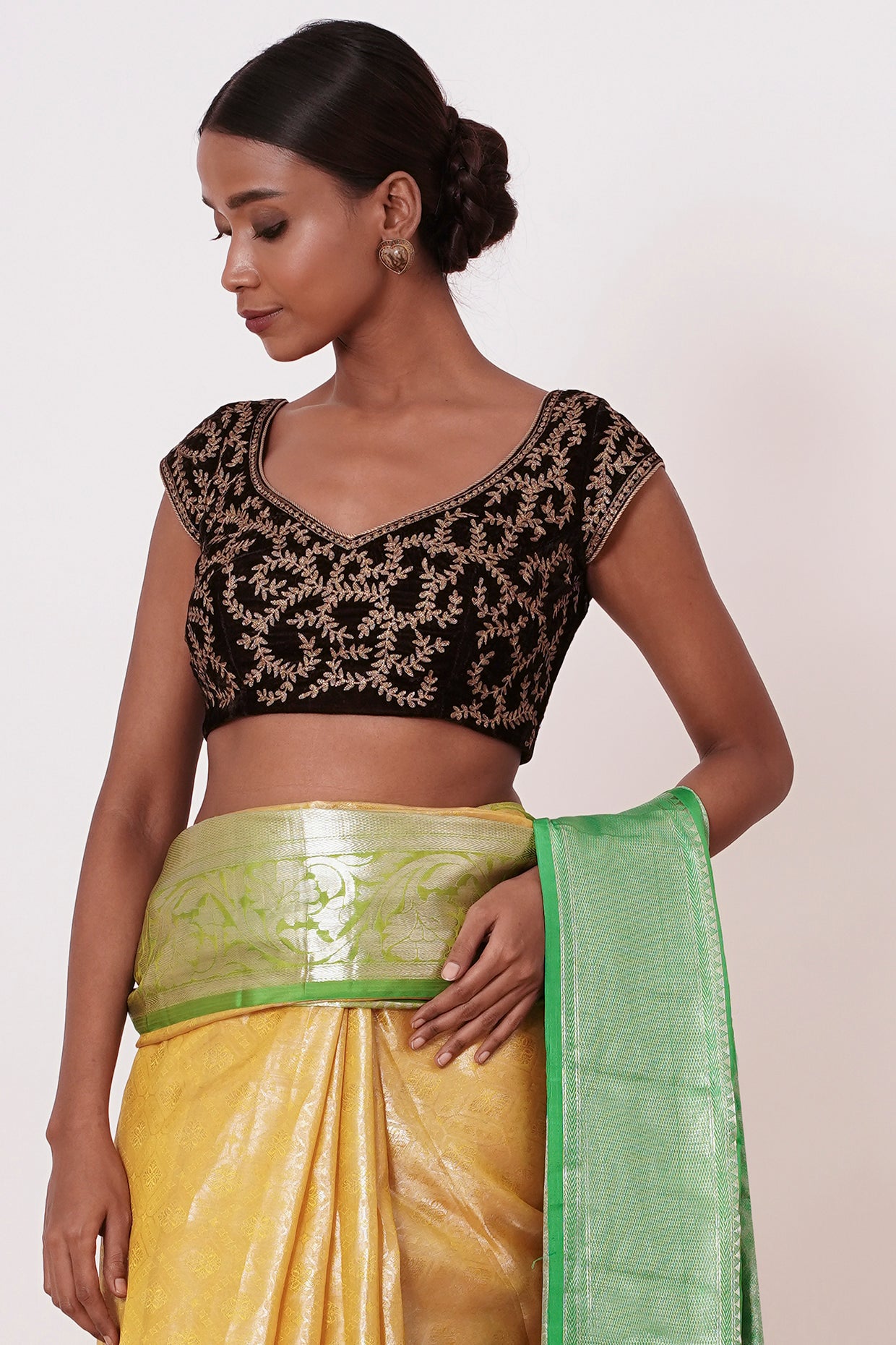 Pastel Yellow Saree with Green Border with Embroidered Velvet Blouse