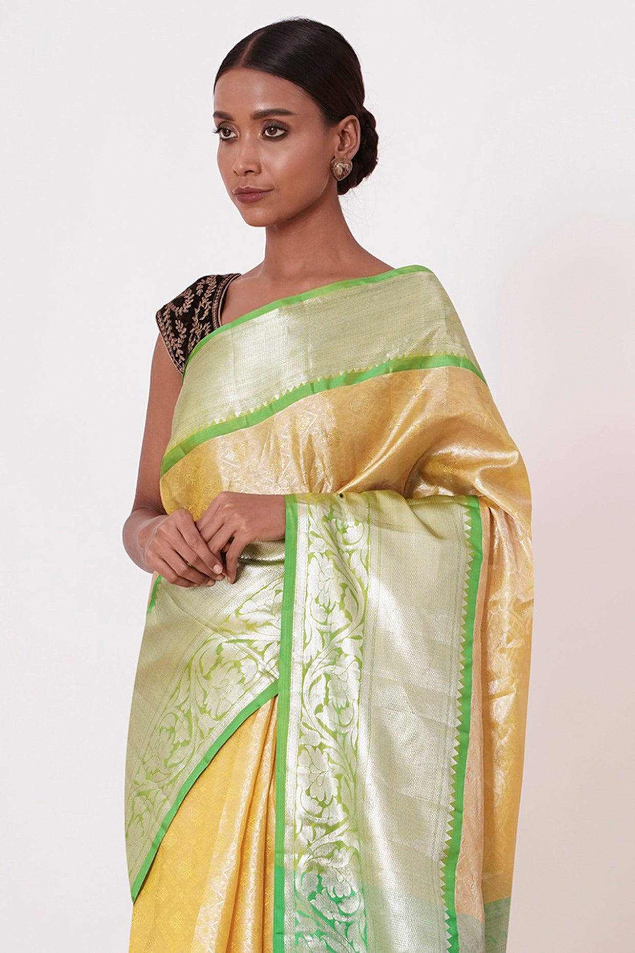 Pastel Yellow Saree with Green Border with Embroidered Velvet Blouse