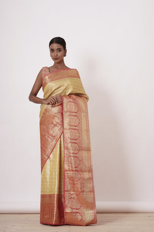 Gold Dharamavaram Silk Saree with a Peach Blouse