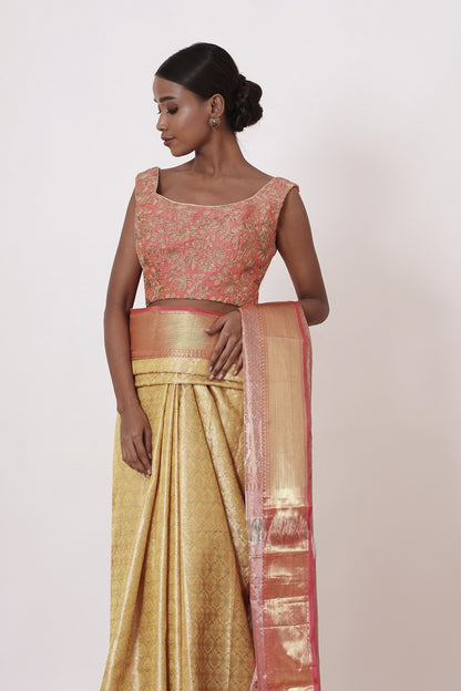 Gold Dharamavaram Silk Saree with a Peach Blouse