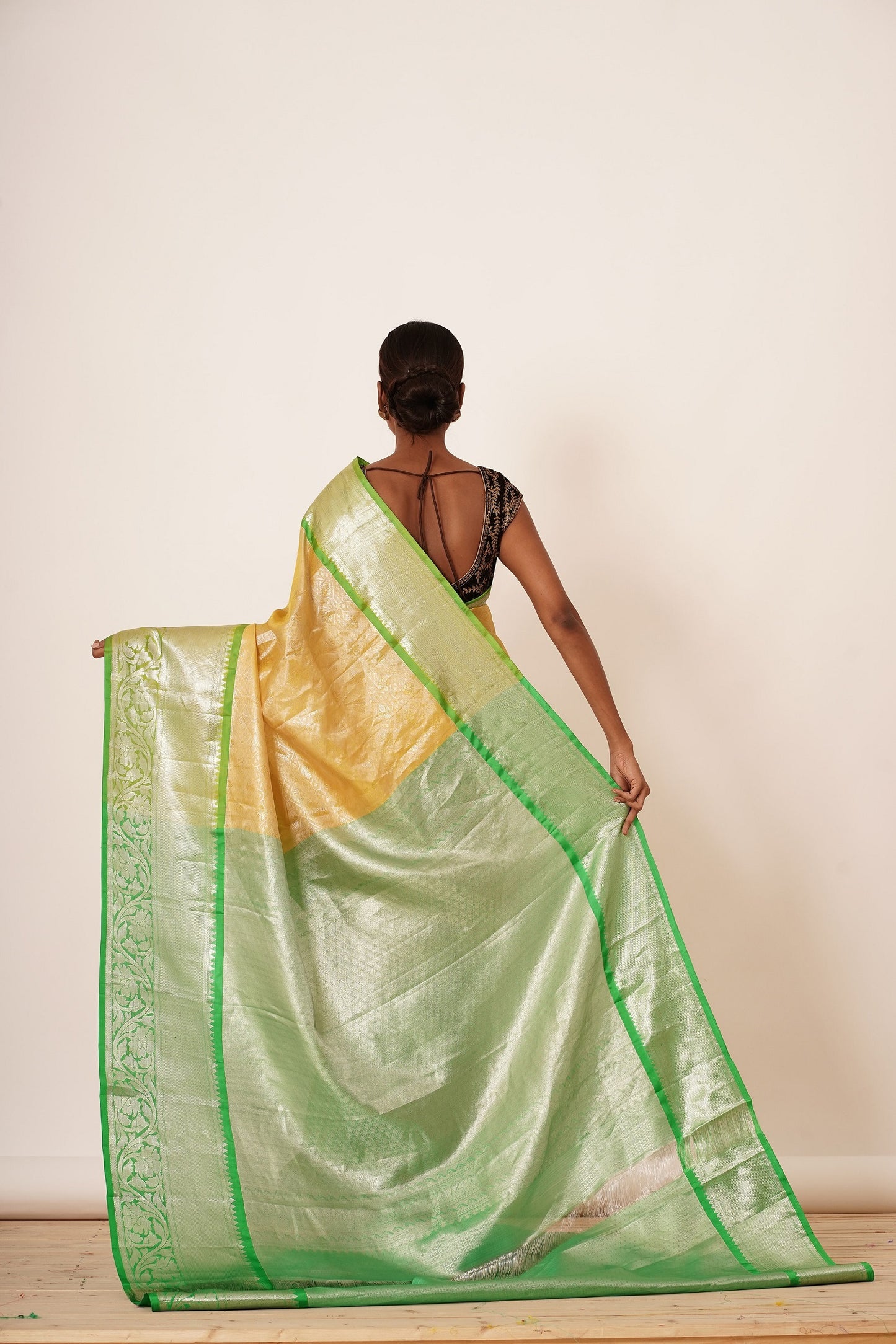 Pastel Yellow Saree with Green Border with Embroidered Velvet Blouse