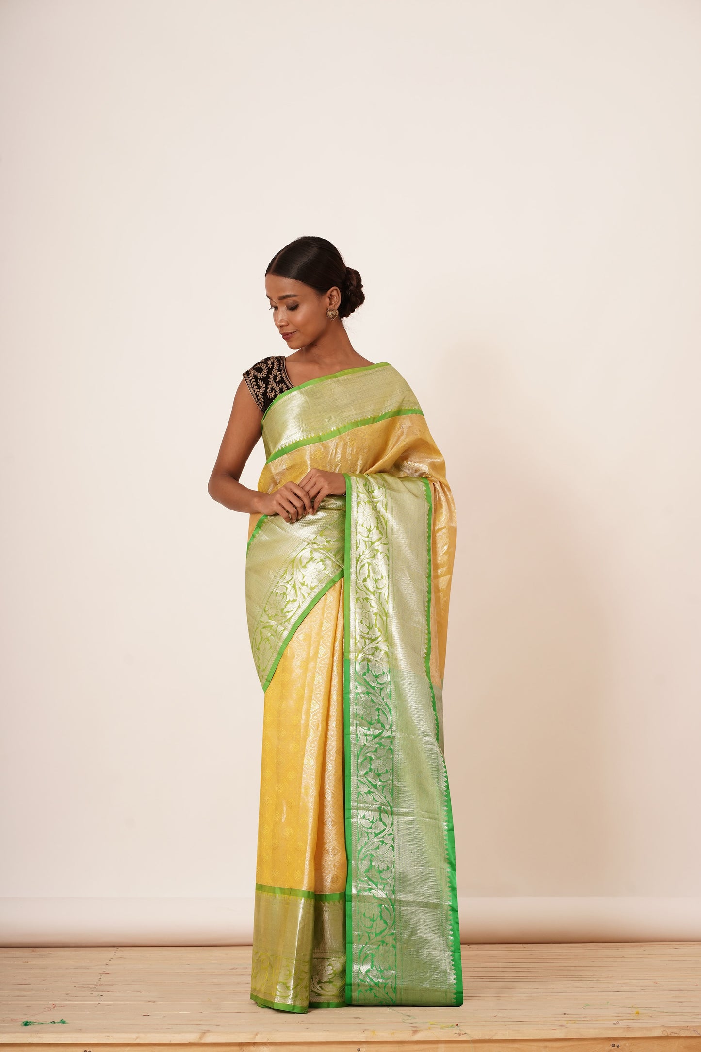 Pastel Yellow Saree with Green Border with Embroidered Velvet Blouse