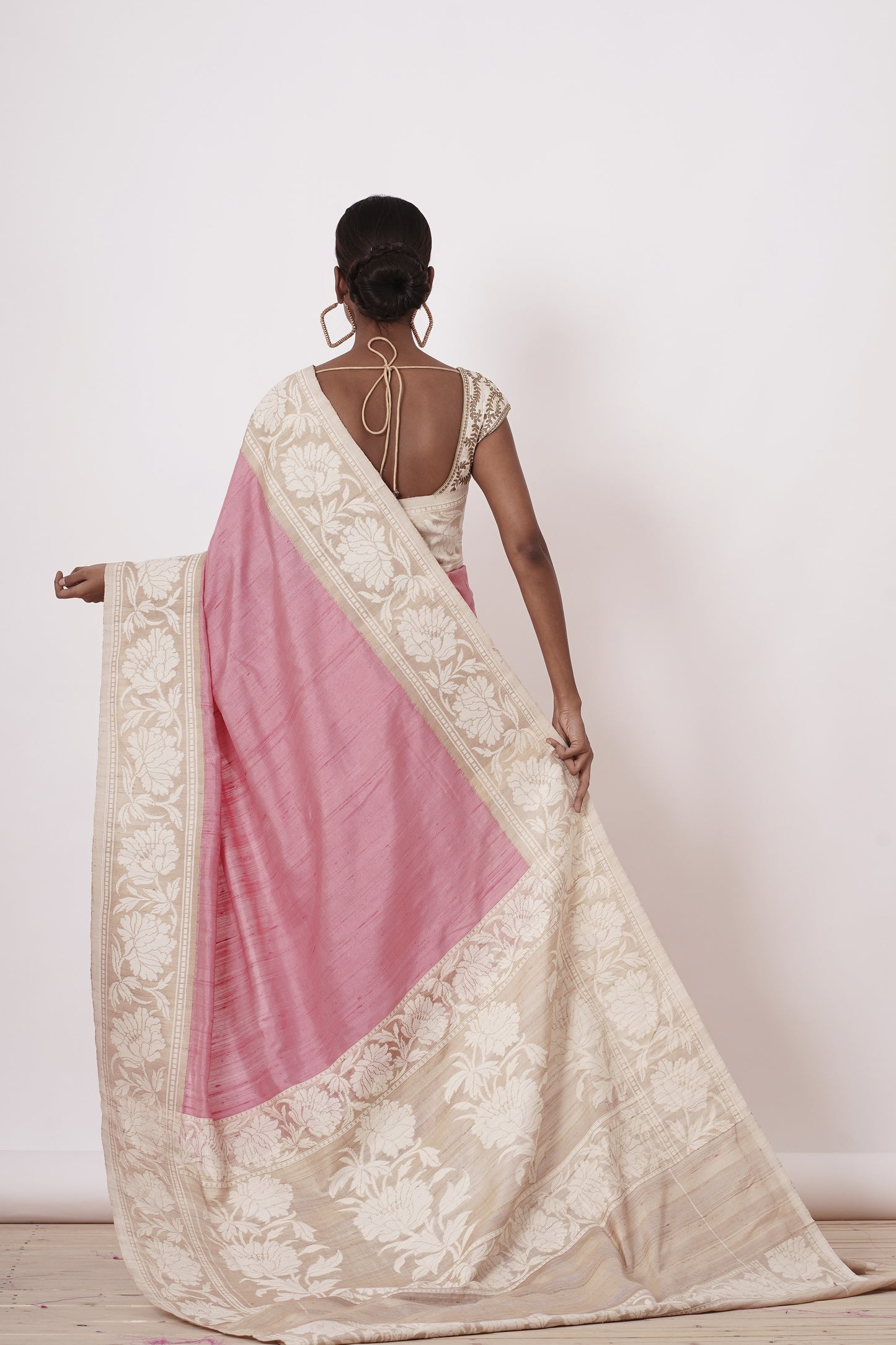 Onion Pink Banarasi Saree with a Cream Blouse