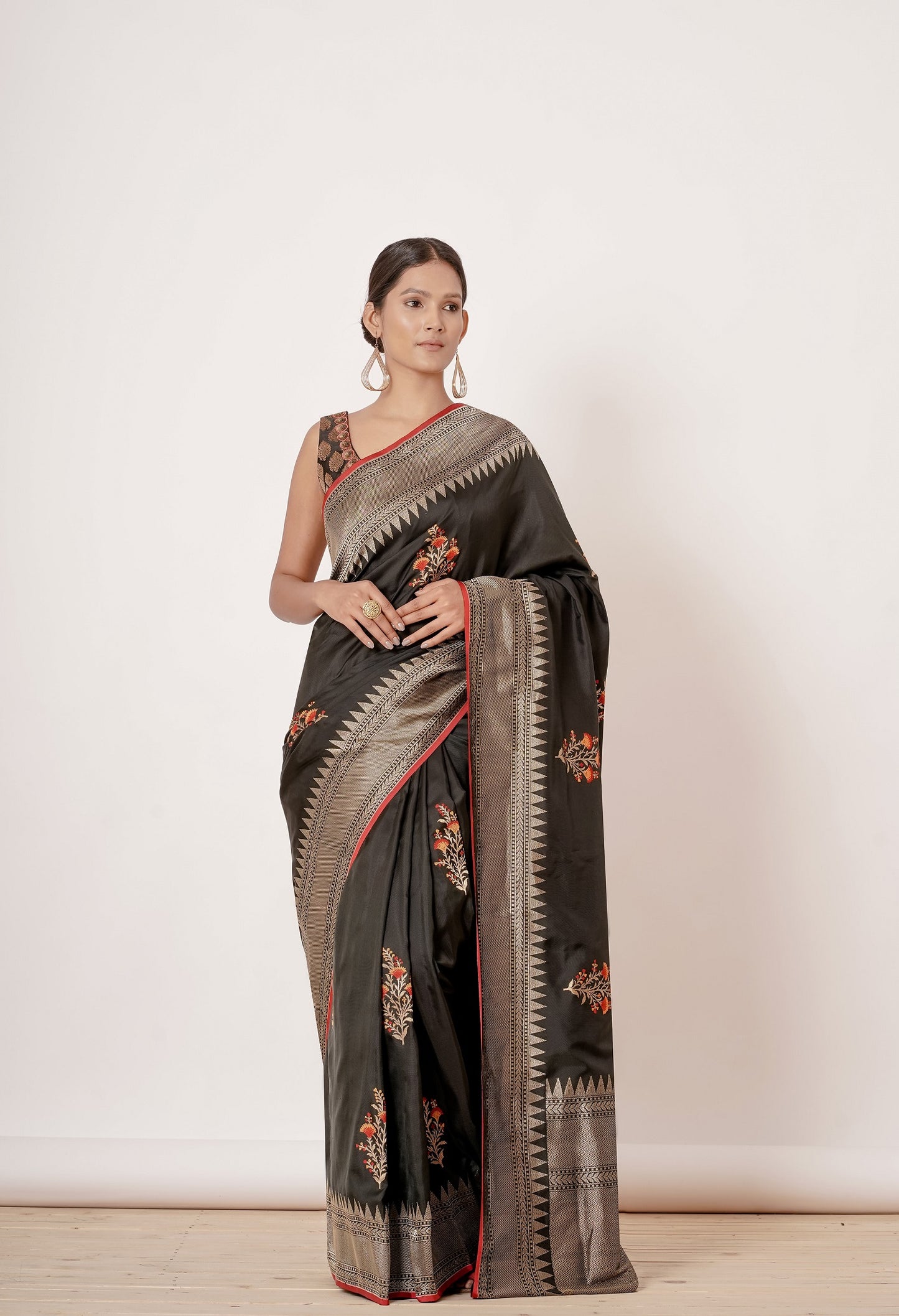 Black Banarasi Silk Saree with Floral Motifs all over and Black Brocade Blouse