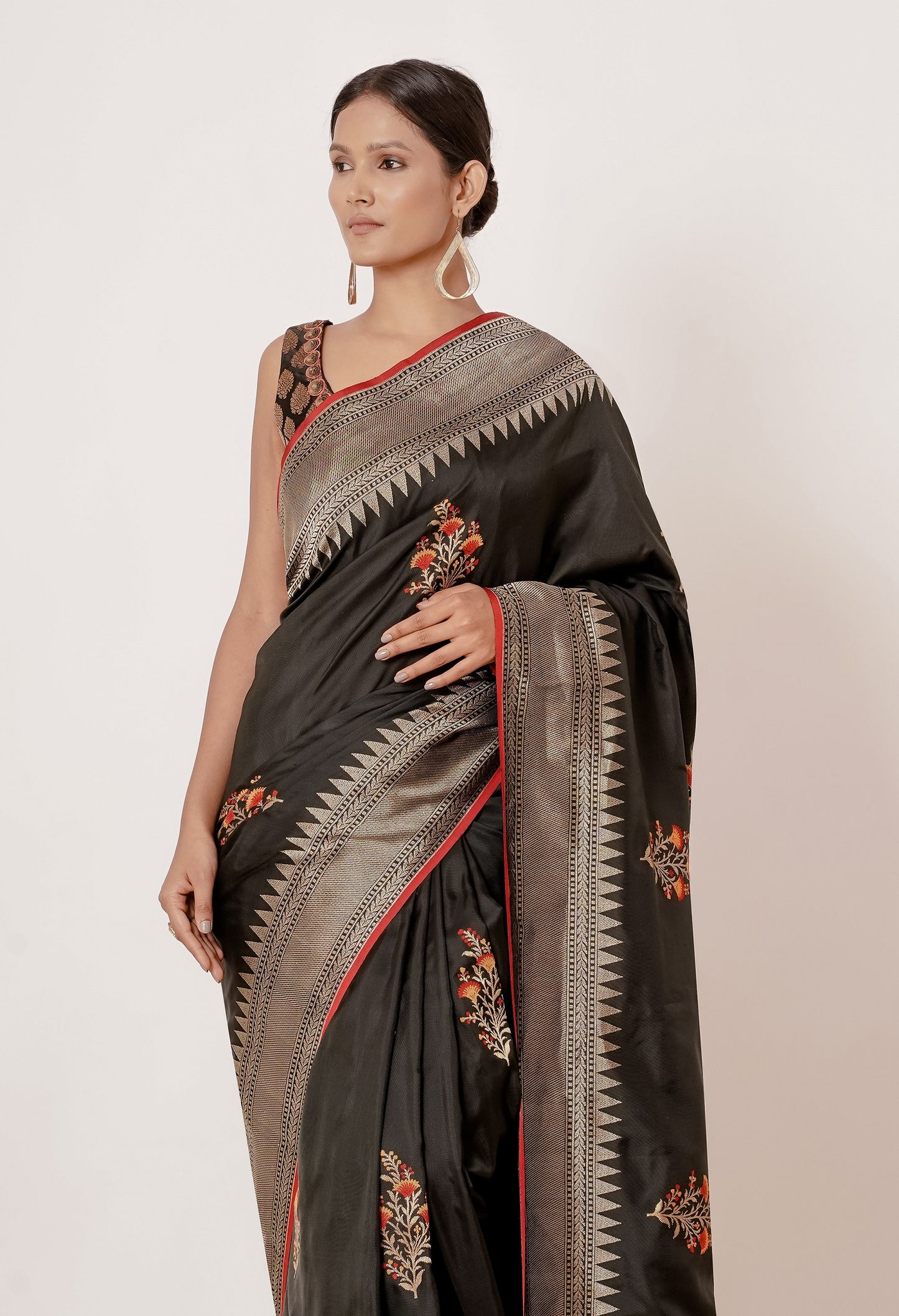 Black Banarasi Silk Saree with Floral Motifs all over and Black Brocade Blouse