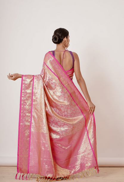 Onion Pink Dharmavaram Silk Saree with a Purple Backless Blouse