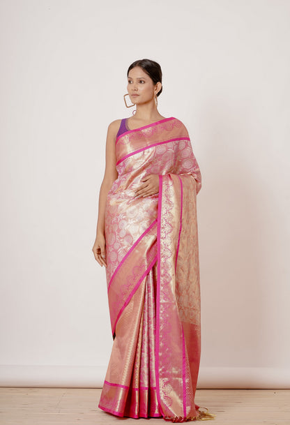 Onion Pink Dharmavaram Silk Saree with a Purple Backless Blouse