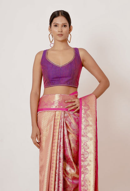 Onion Pink Dharmavaram Silk Saree with a Purple Backless Blouse