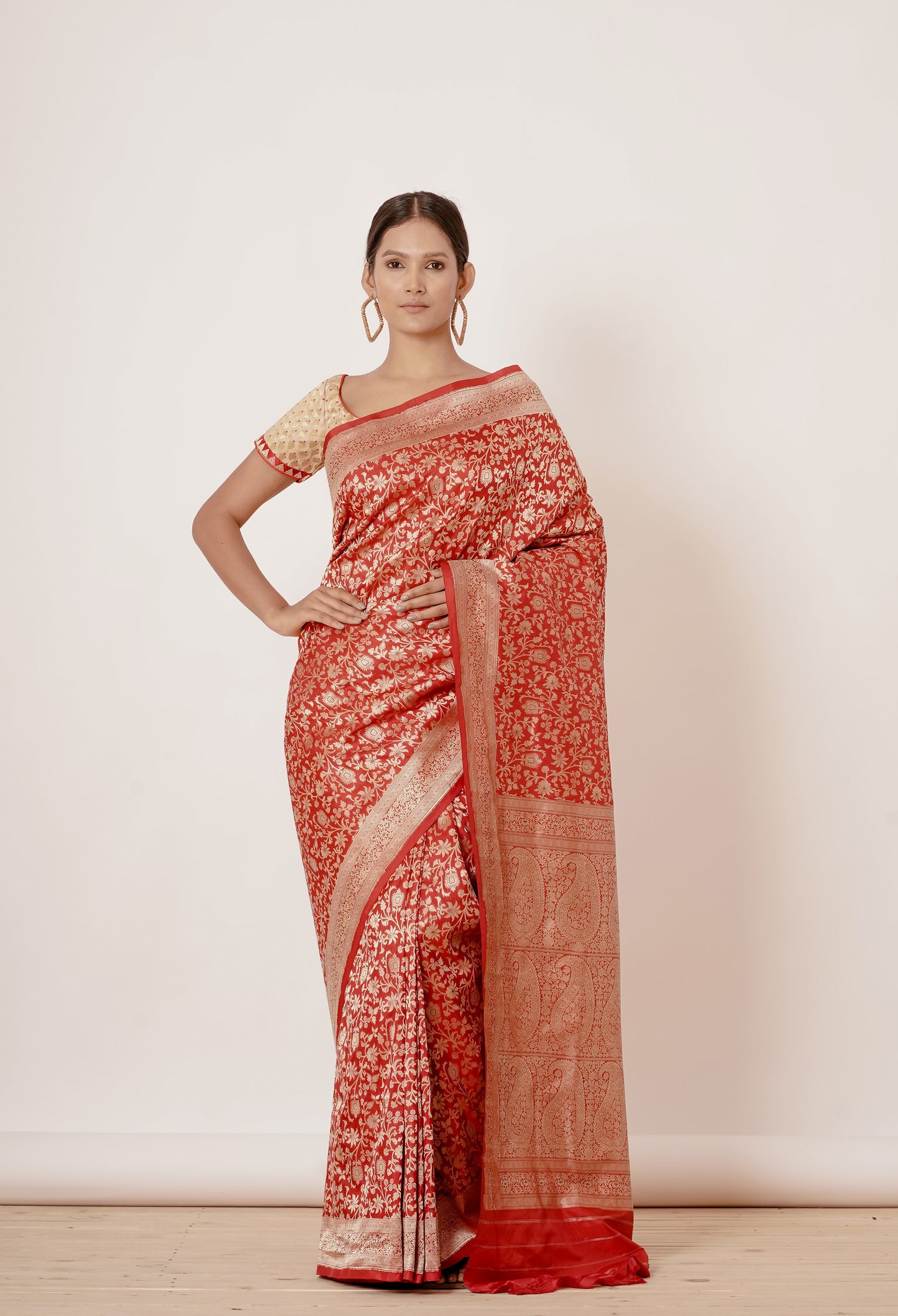 Red Ganarasi Silk Saree with Gold Backless Blouse