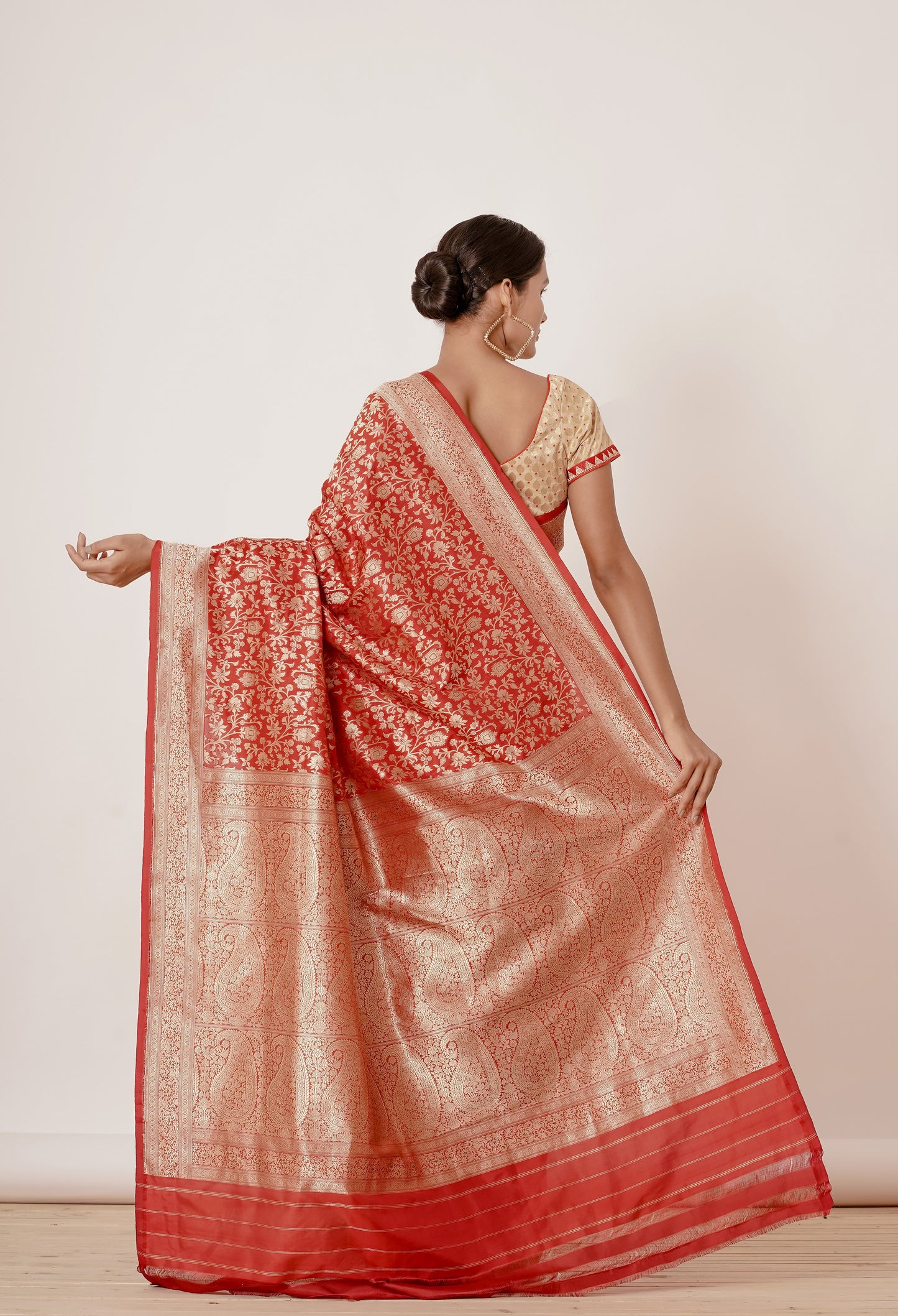 Red Ganarasi Silk Saree with Gold Backless Blouse