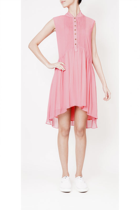 Flared coral pleated dress