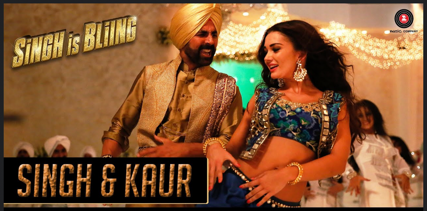 Amy Jackson In Blue Blouse, jacket and Dhoti set