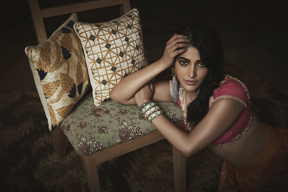 Shruti Hassan in Pink & Mustard Yellow Floral Temple Embroidered Heavy Lehenga Set