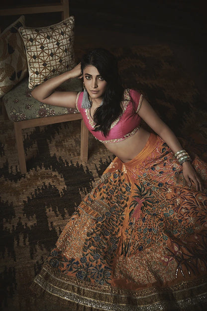 Shruti Hassan in Pink & Mustard Yellow Floral Temple Embroidered Heavy Lehenga Set